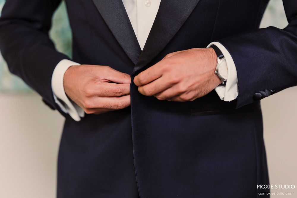 Detail shots of men adjusting formal tuxedo suits and bow ties.