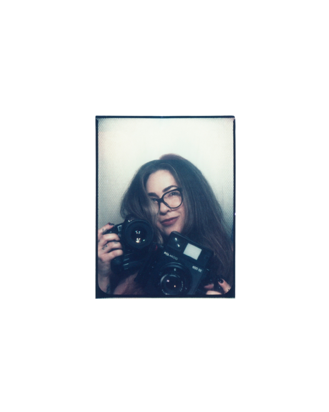 A series of selfie photos showing someone with glasses posing with a camera in various angles.