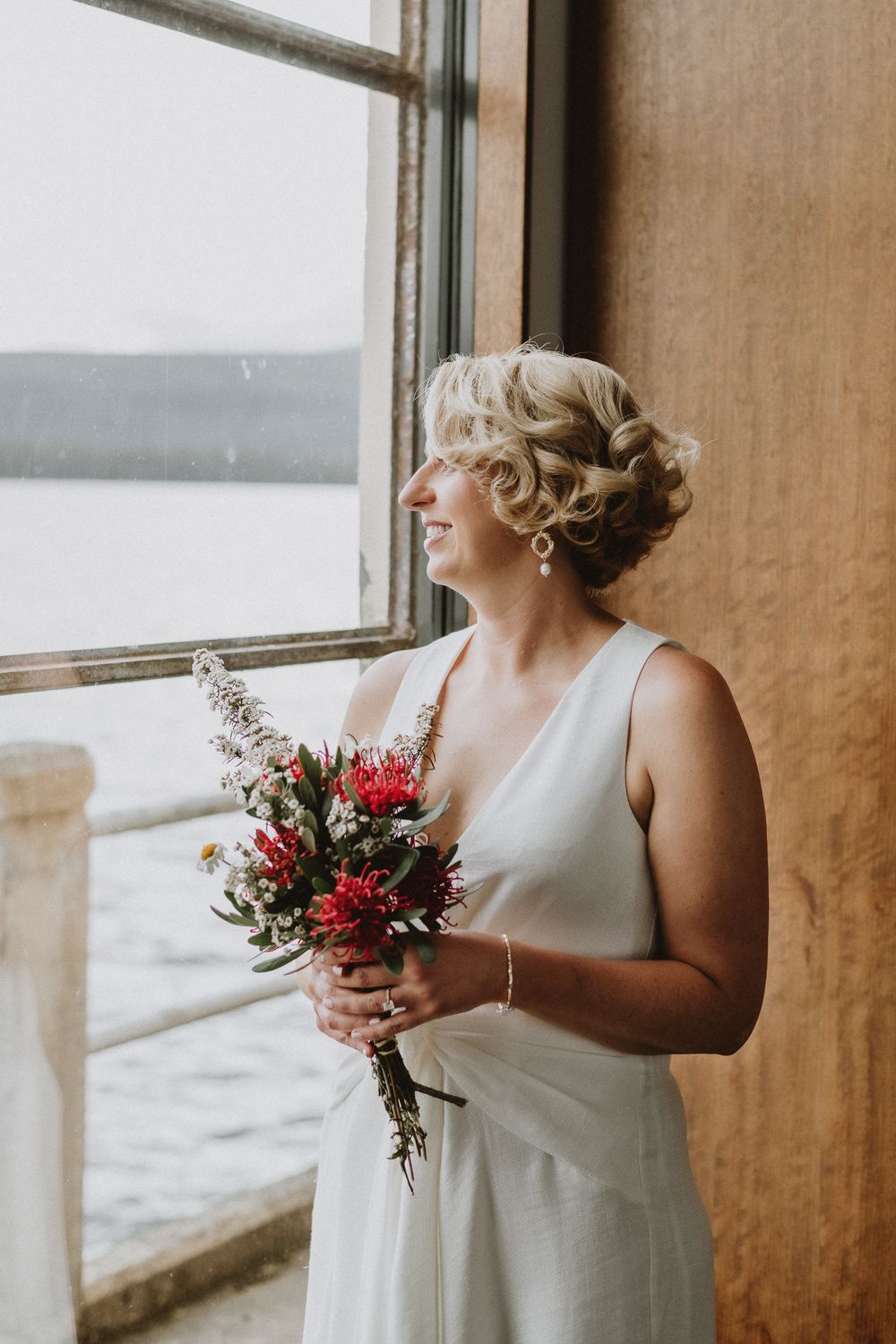 bride at elopement at Pumphouse Point, Lake St Clair wilderness Resort by Joss Jensen Photography