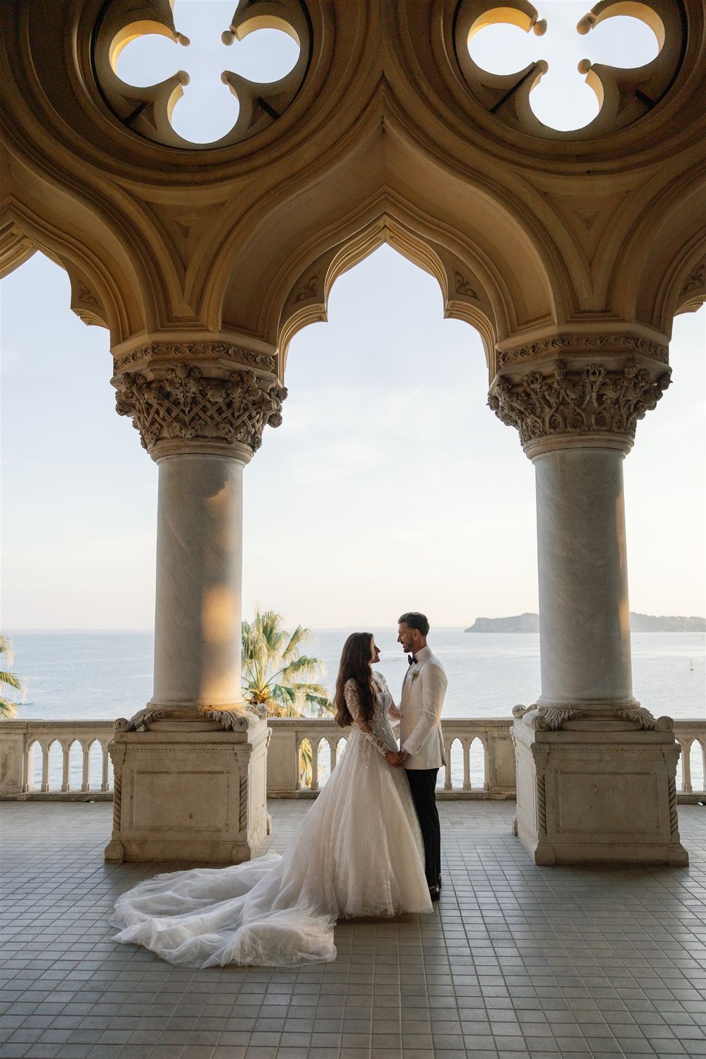 Bride and groom at the iconic Loggia of Isola del Garda