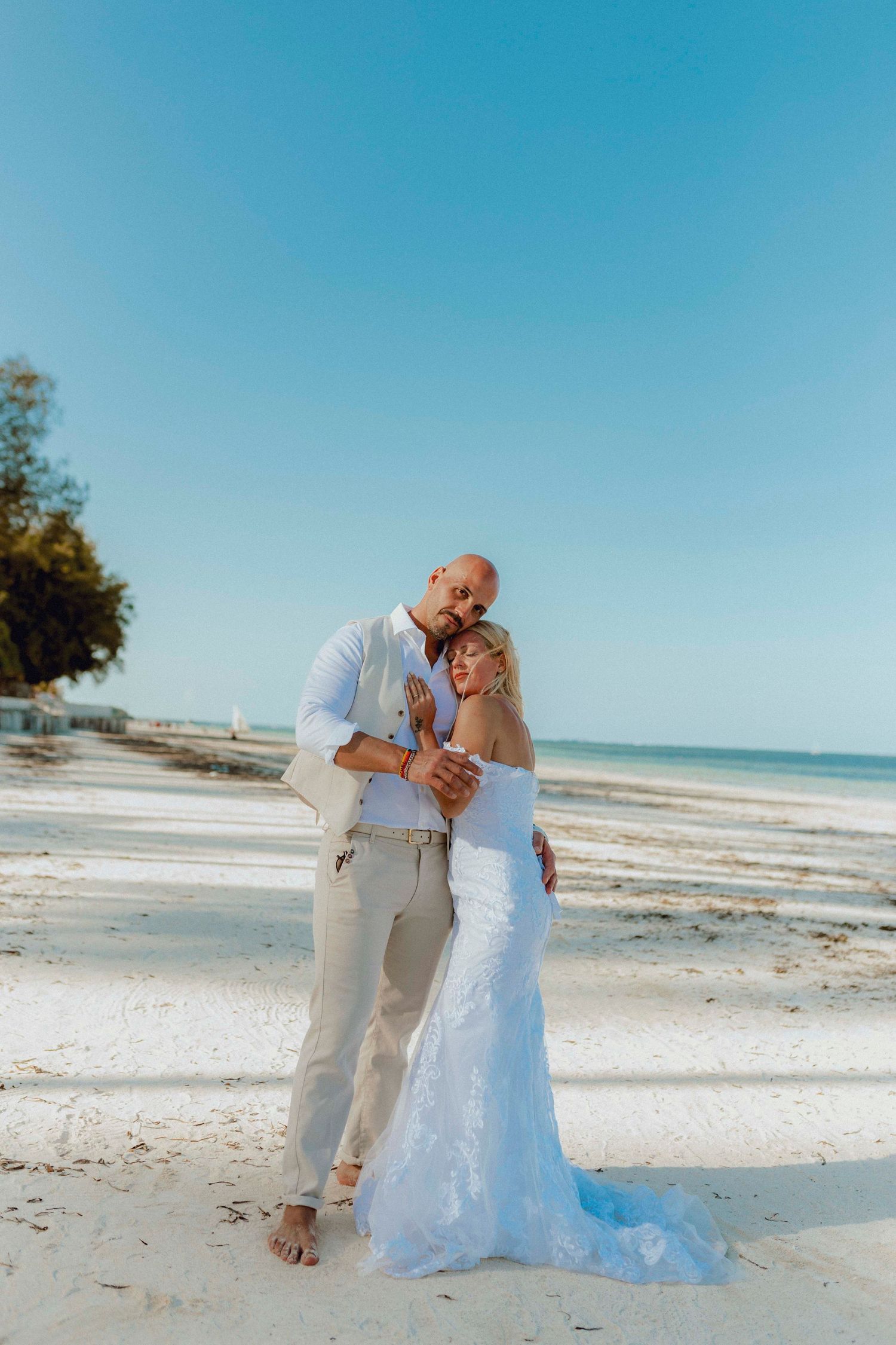 Intimate wedding moment captured on a Zanzibar beach resort.