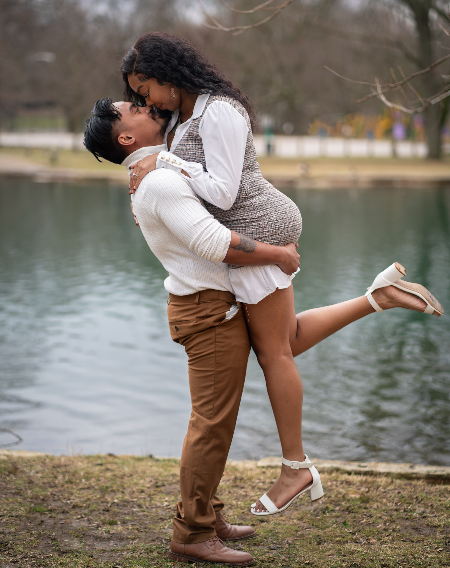 A romantic couple pose for their engagement session