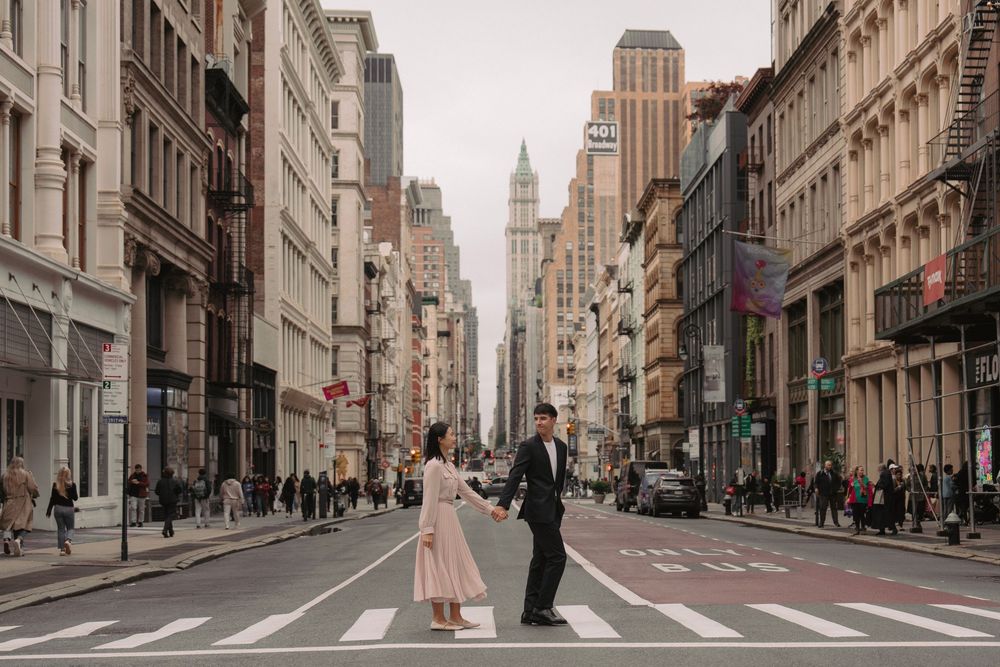 Elegant urban street scene with historic architecture and ornate building facades in a city setting.