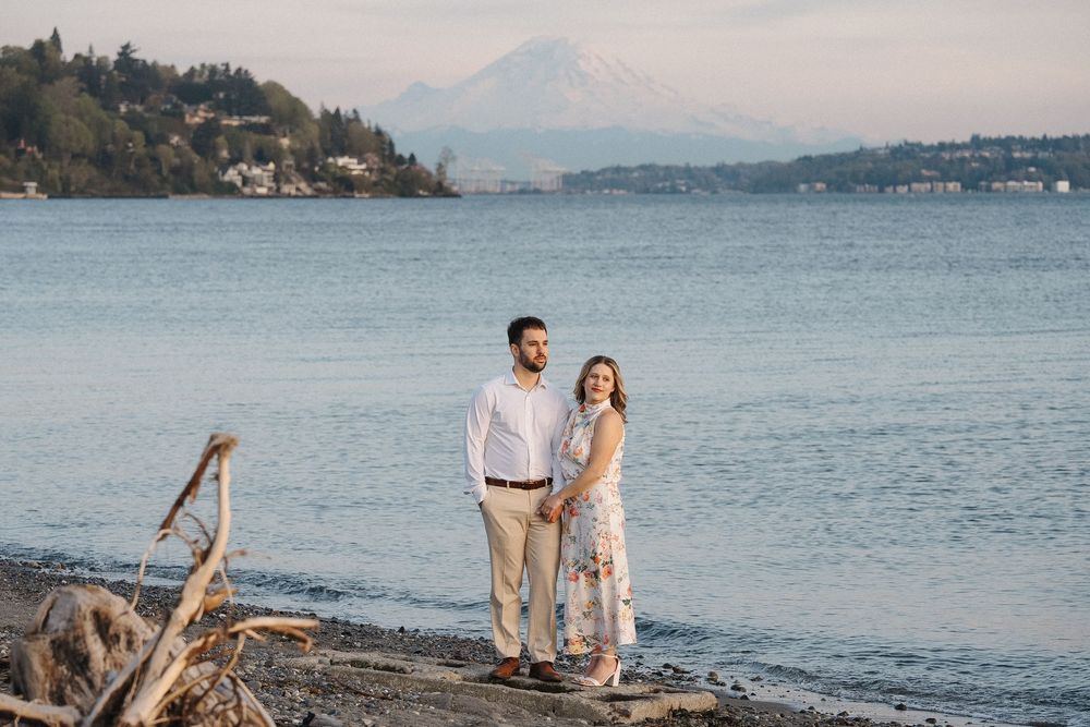 Scenic coastal engagement photo session with Mount Rainier and Puget Sound views in Seattle.
