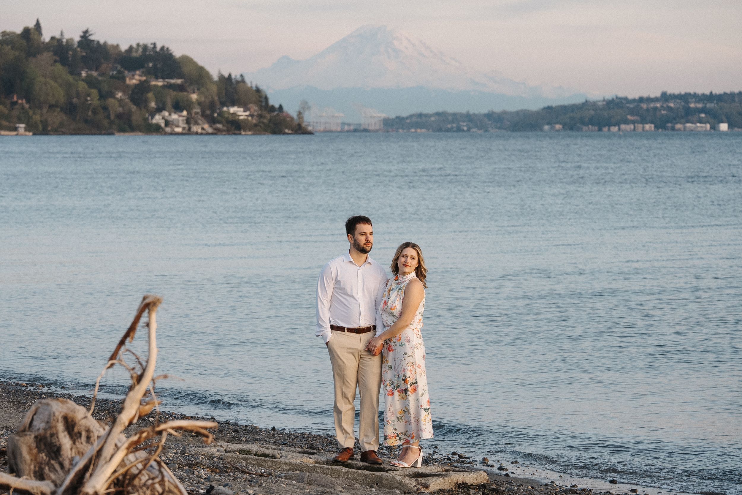 Scenic coastal engagement photo session with Mount Rainier and Puget Sound views in Seattle.