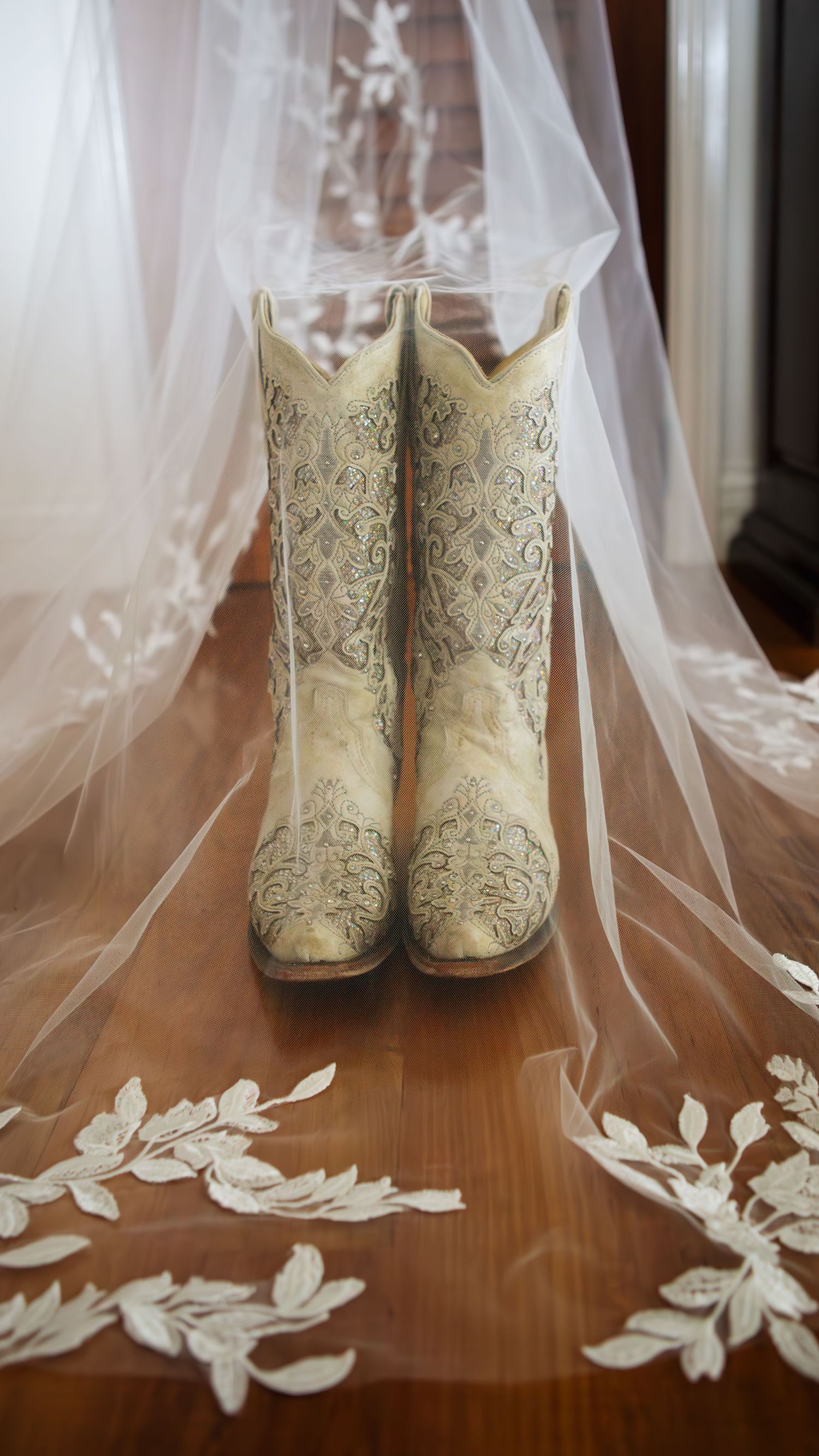 Western  cowgirl boots under veil at Port Douglas country wedding