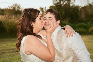 Close-up shots of romantic wedding couple sharing tender moments outdoors.