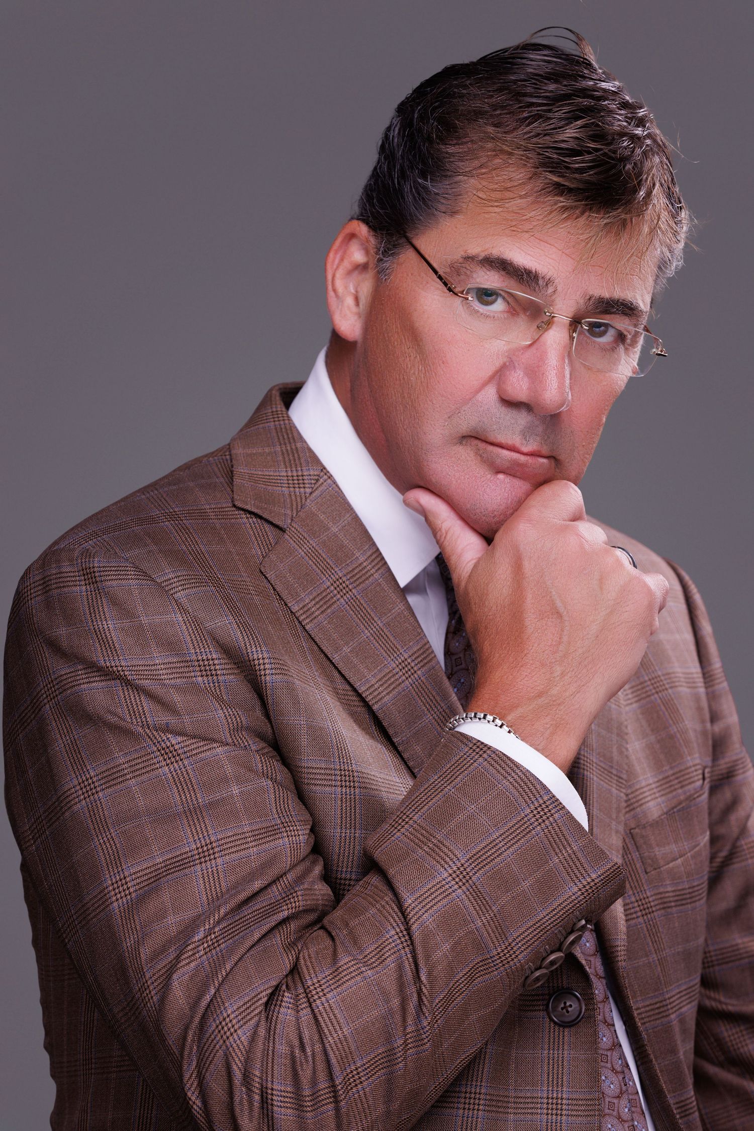 Professional U.S. passport photo taken at Wilson Photos LLC in Alpharetta, GA  Studio headshot session for LinkedIn and company websites in