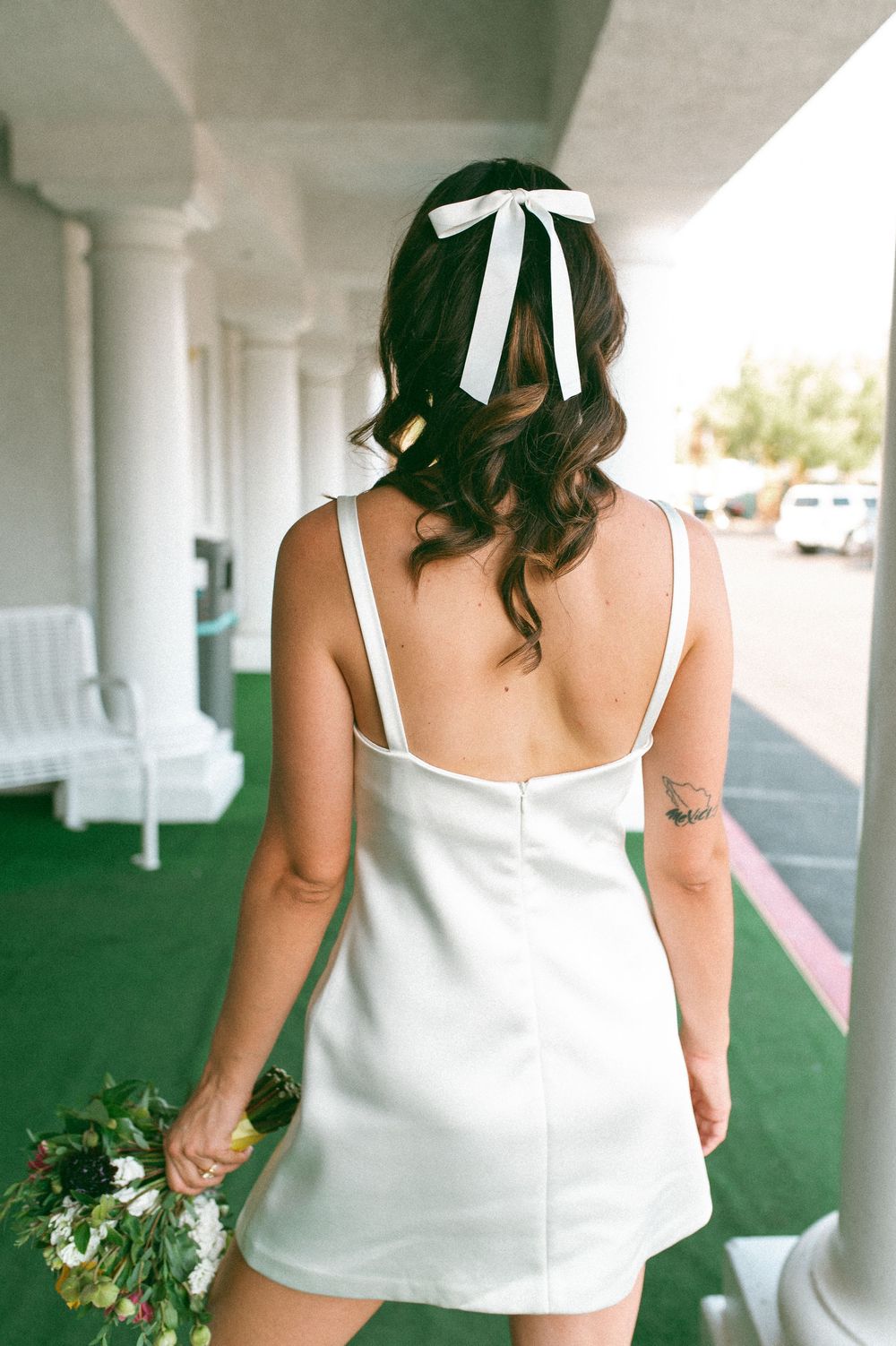 Pink cadillac elopement at Little White chapel