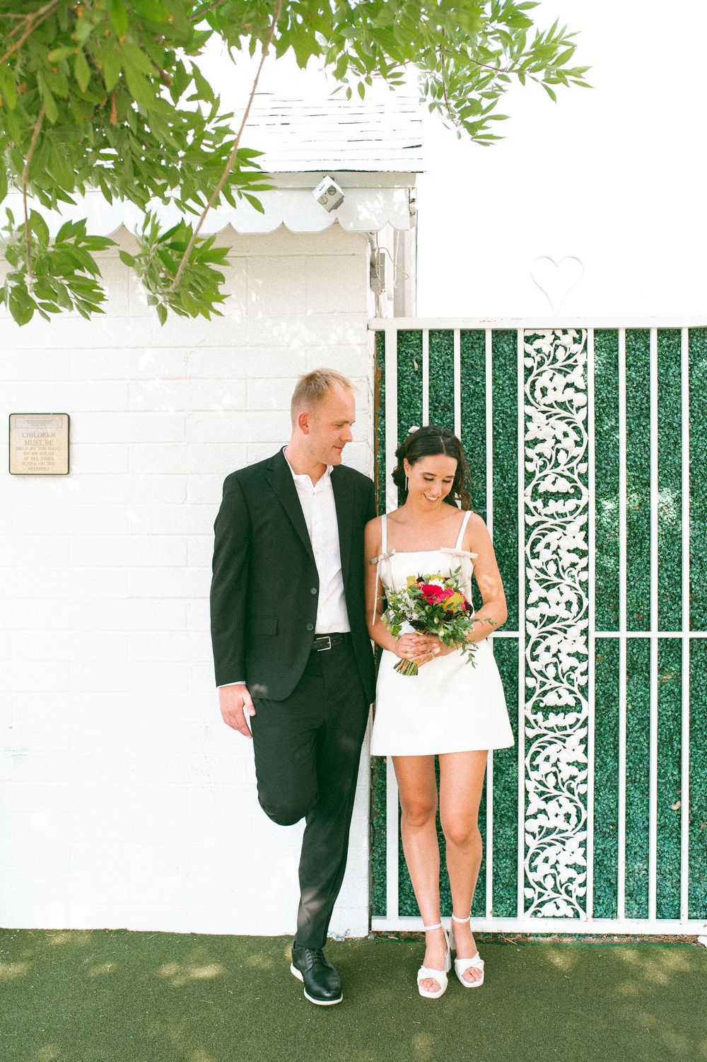 Pink cadillac elopement at Little White chapel