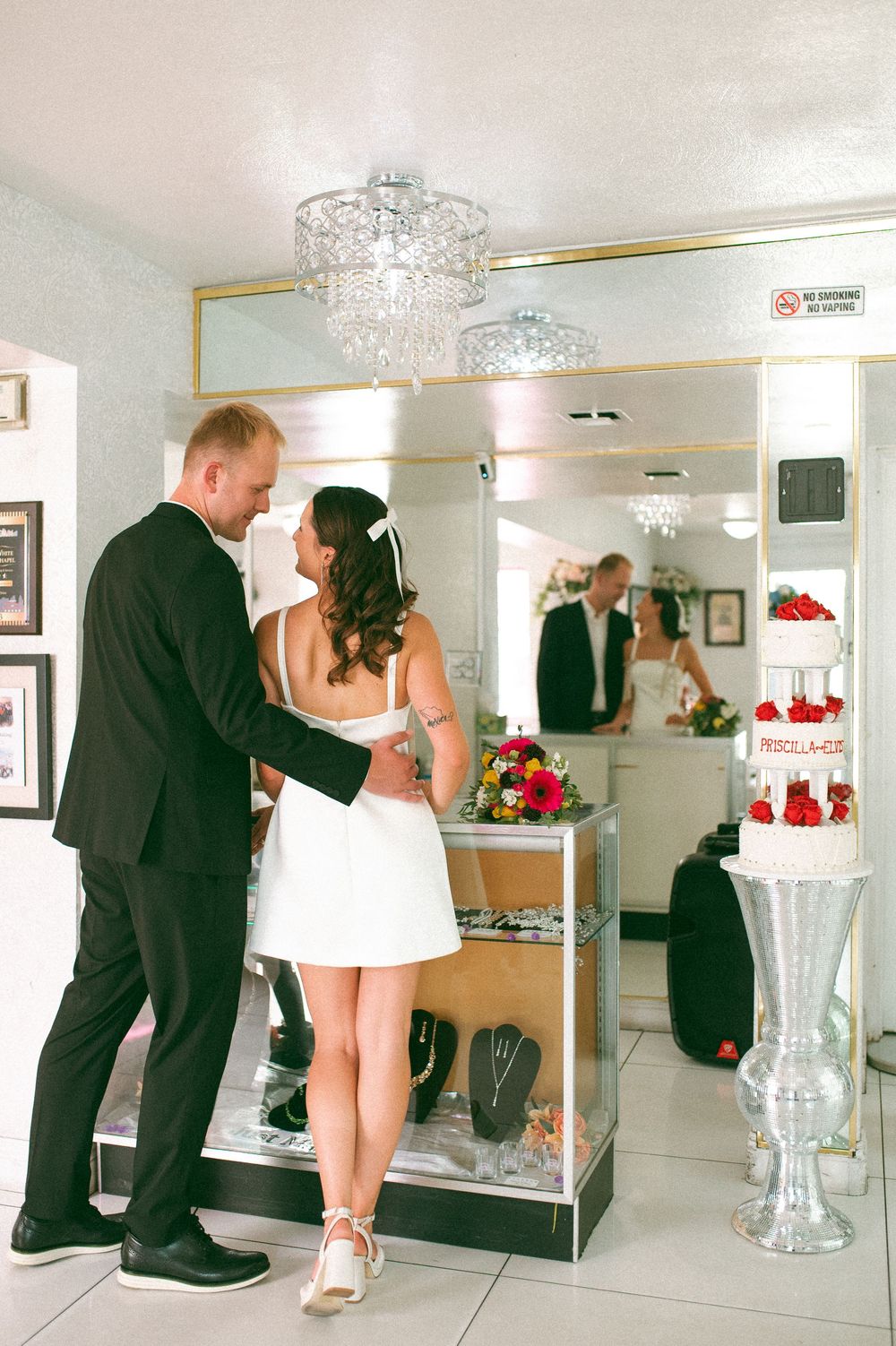 Pink cadillac elopement at Little White chapel