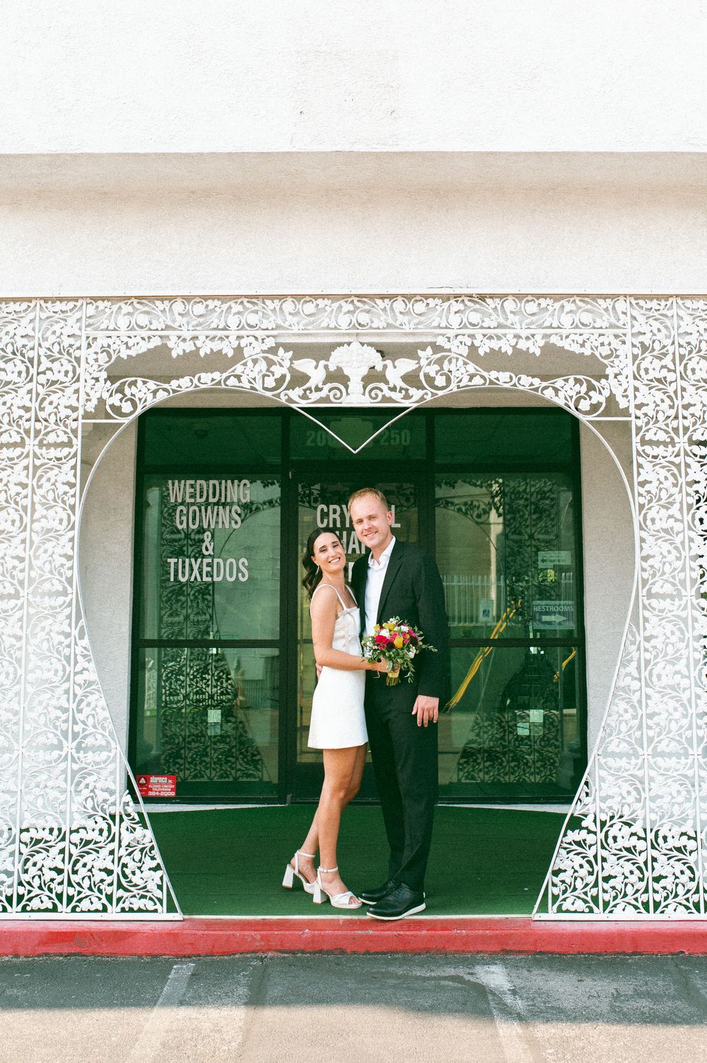 Pink cadillac elopement at Little White chapel