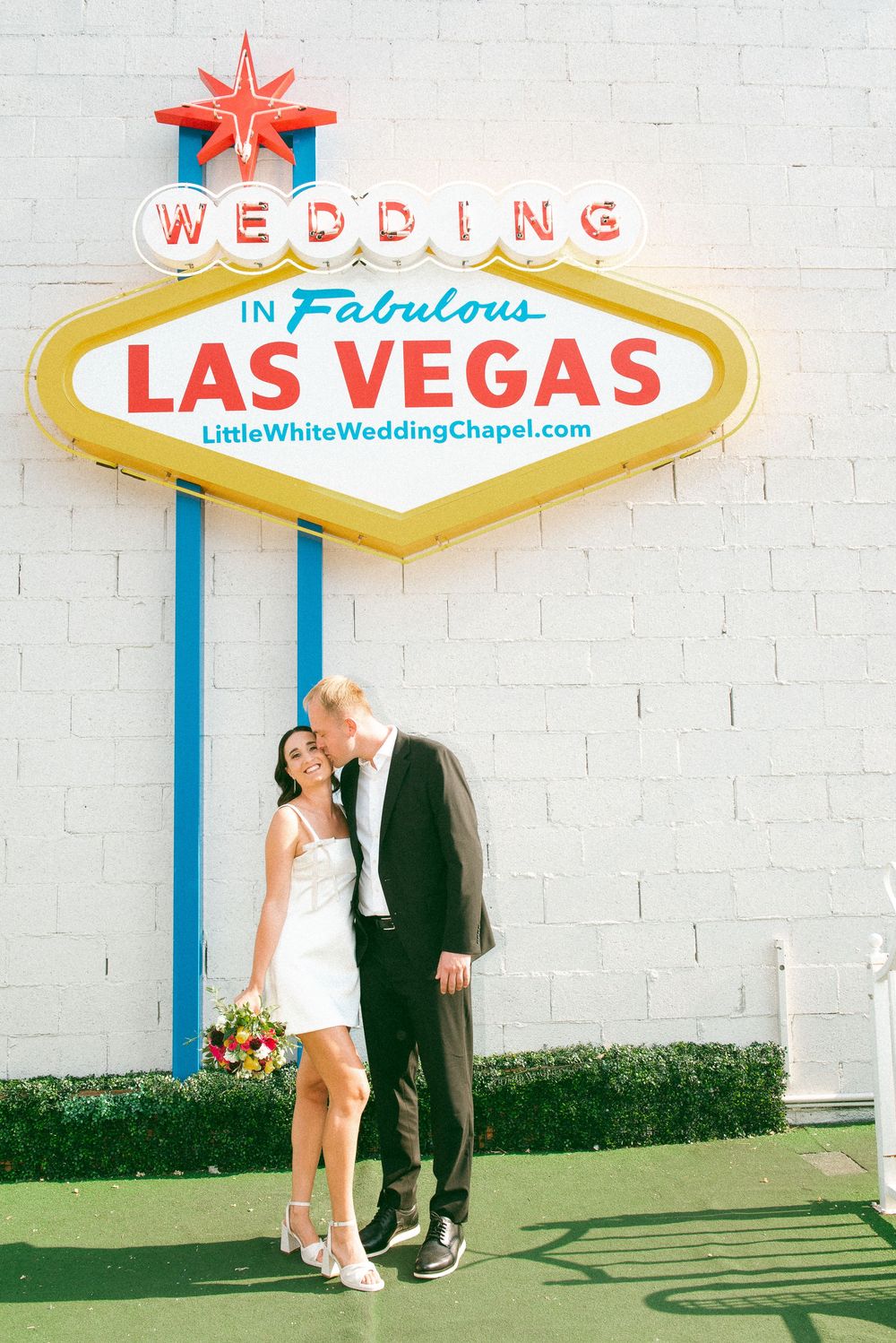 Pink cadillac elopement at Little White chapel