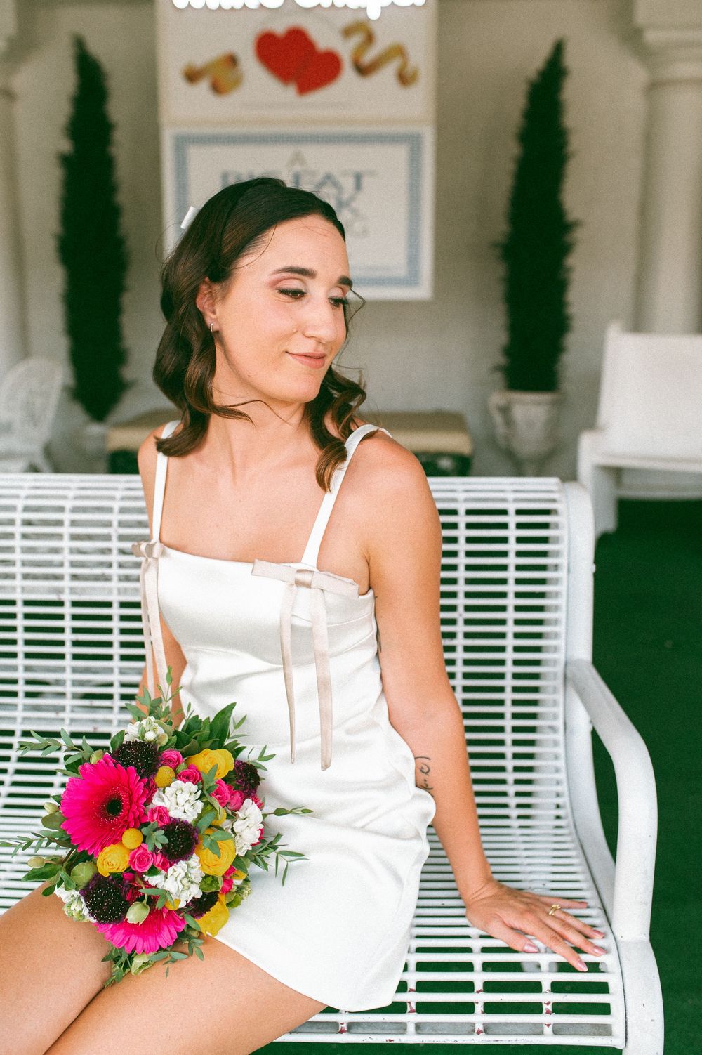 Pink cadillac elopement at Little White chapel