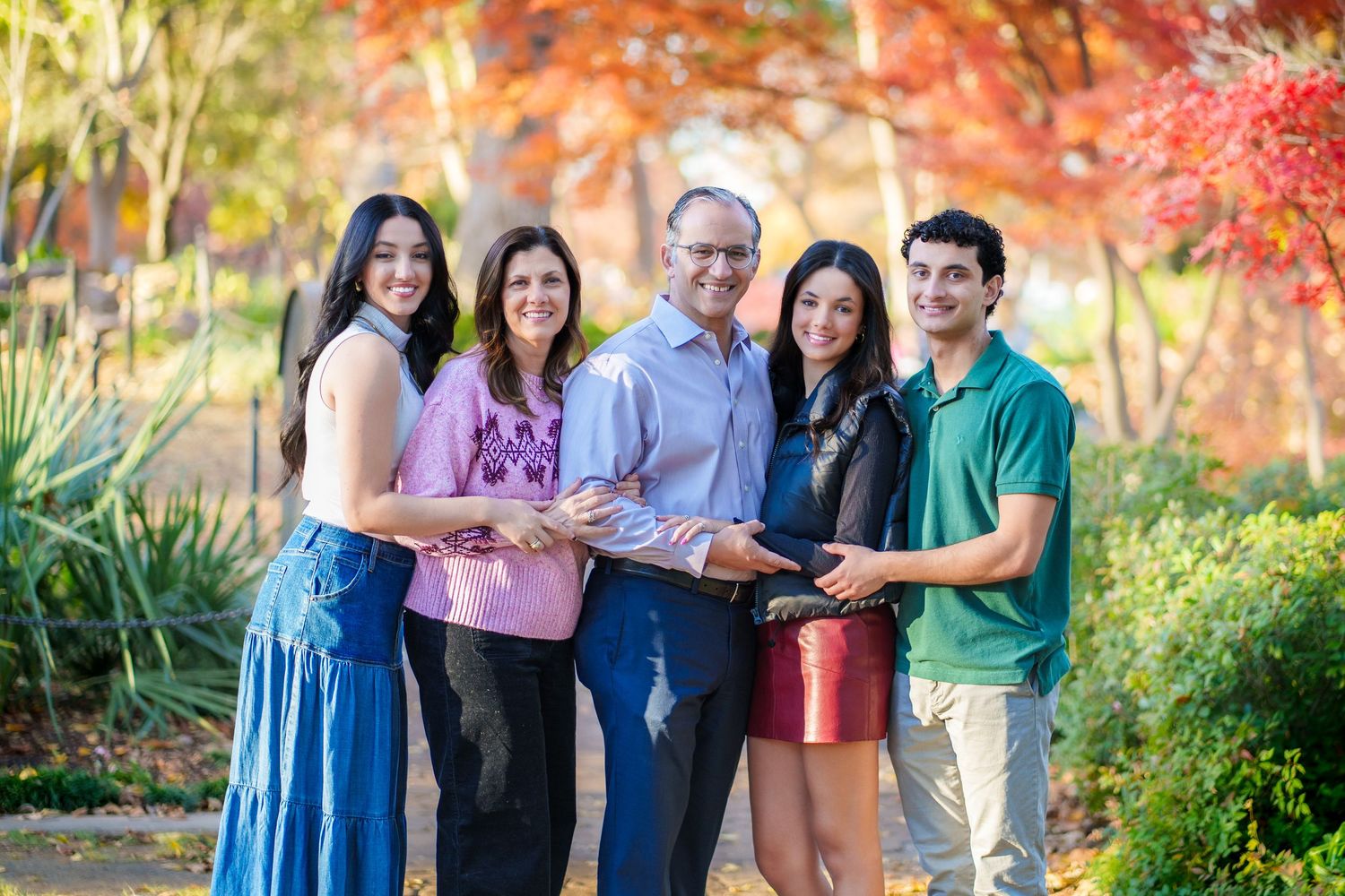 Fall family photo session orange and red trees Grapevine Botanical gardens TX fall outfit outdoors portraits Christmas card