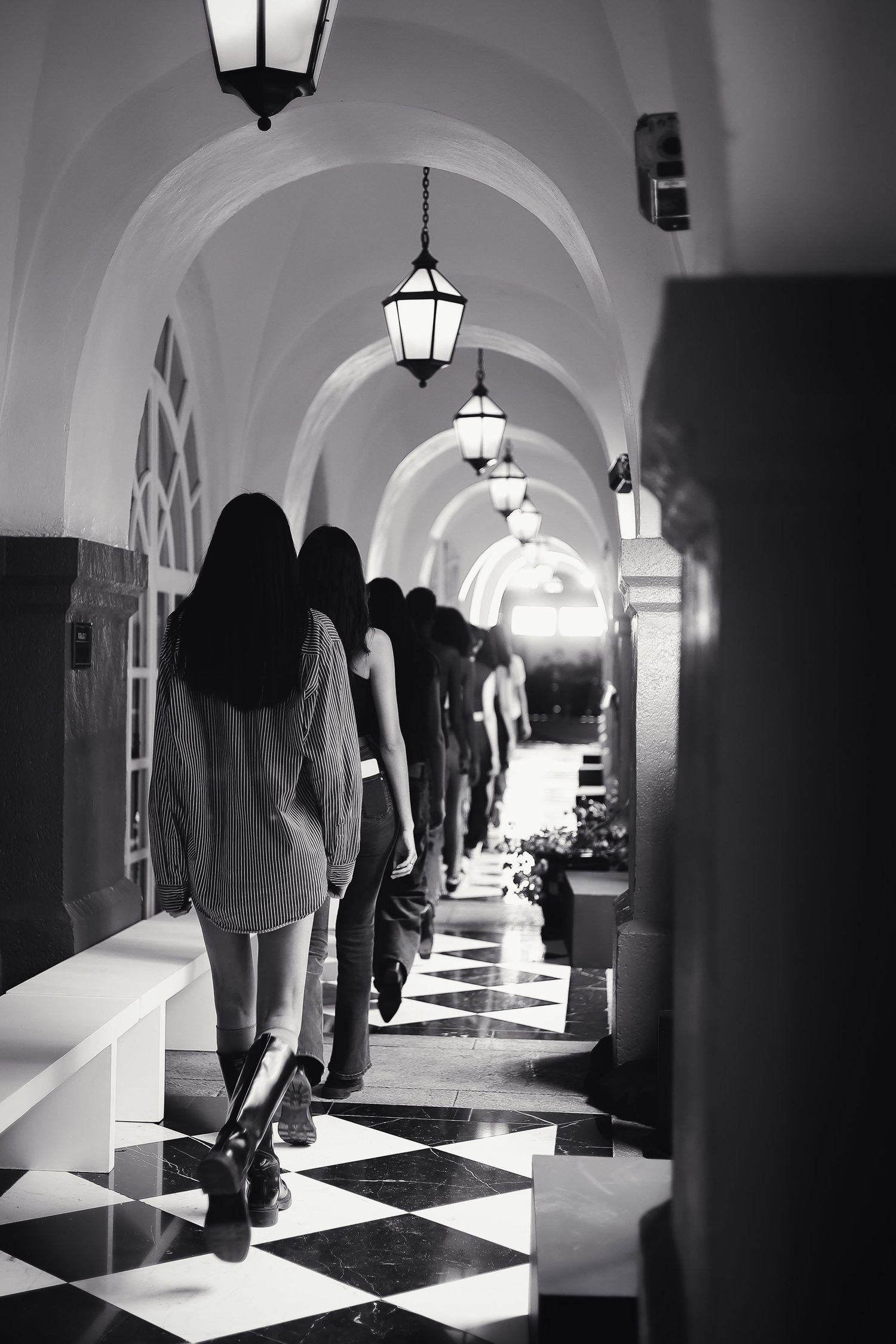 Black-and-white runway photography in arched hallway | Mexico Fashion Week by Dario Hudon, Le Café Studio
