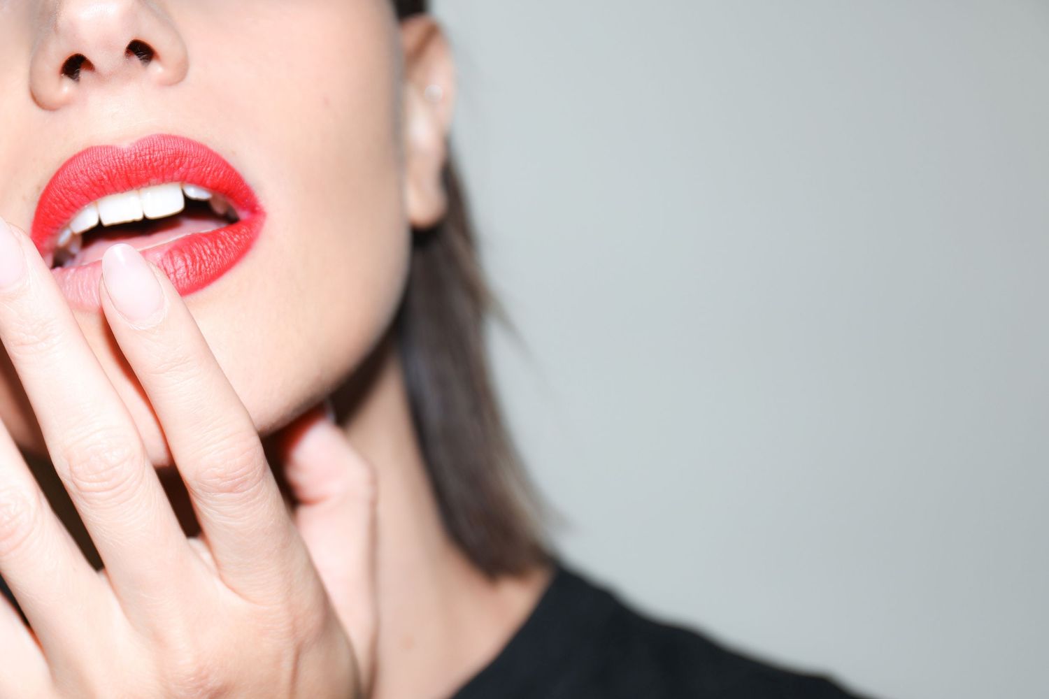 Fashion close-up with bold red lipstick and hand pose | Creative editorial by Dario Hudon, Le Café Studio