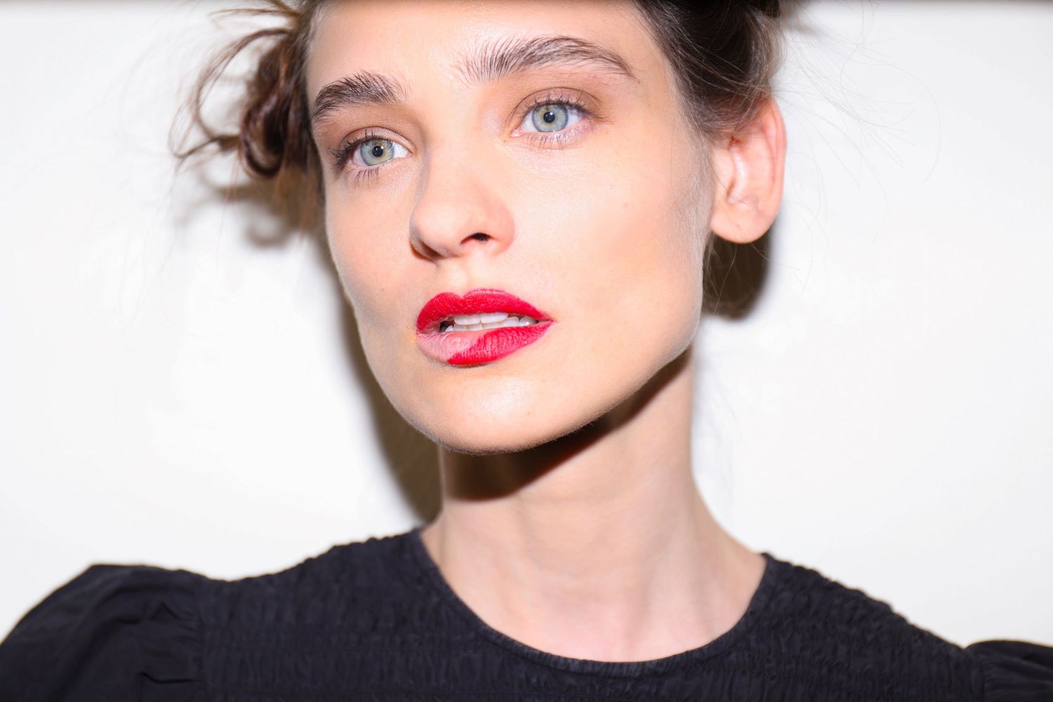 Minimalist close-up portrait with striking red lips | Editorial fashion photography by Dario Hudon, Le Café Studio
