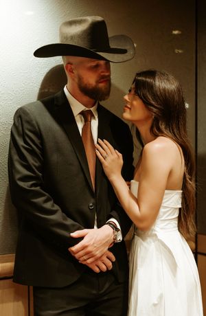 An intimate portrait series of a couple in black and white formal wear.