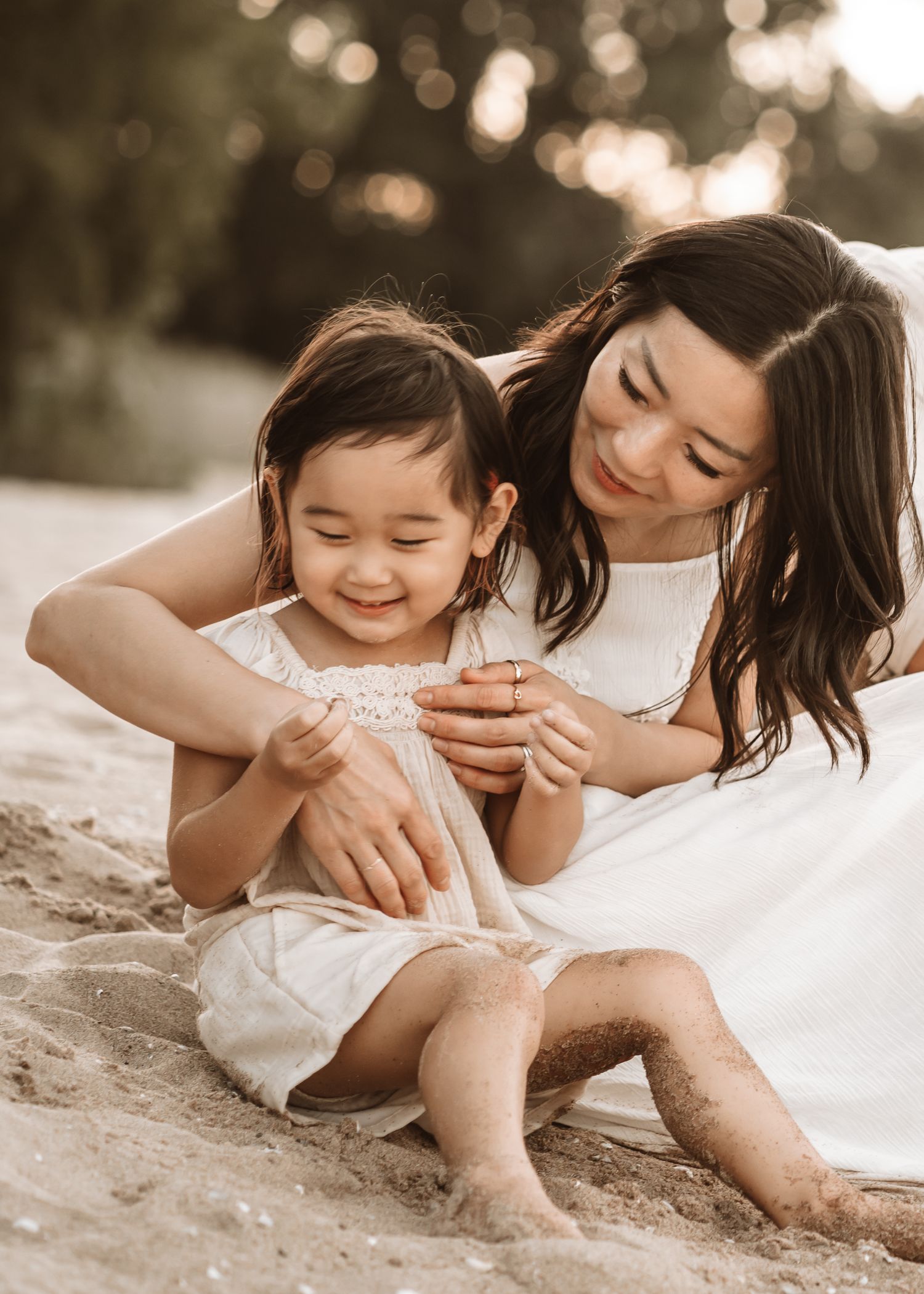 Dad holding daughter during a storytelling family session