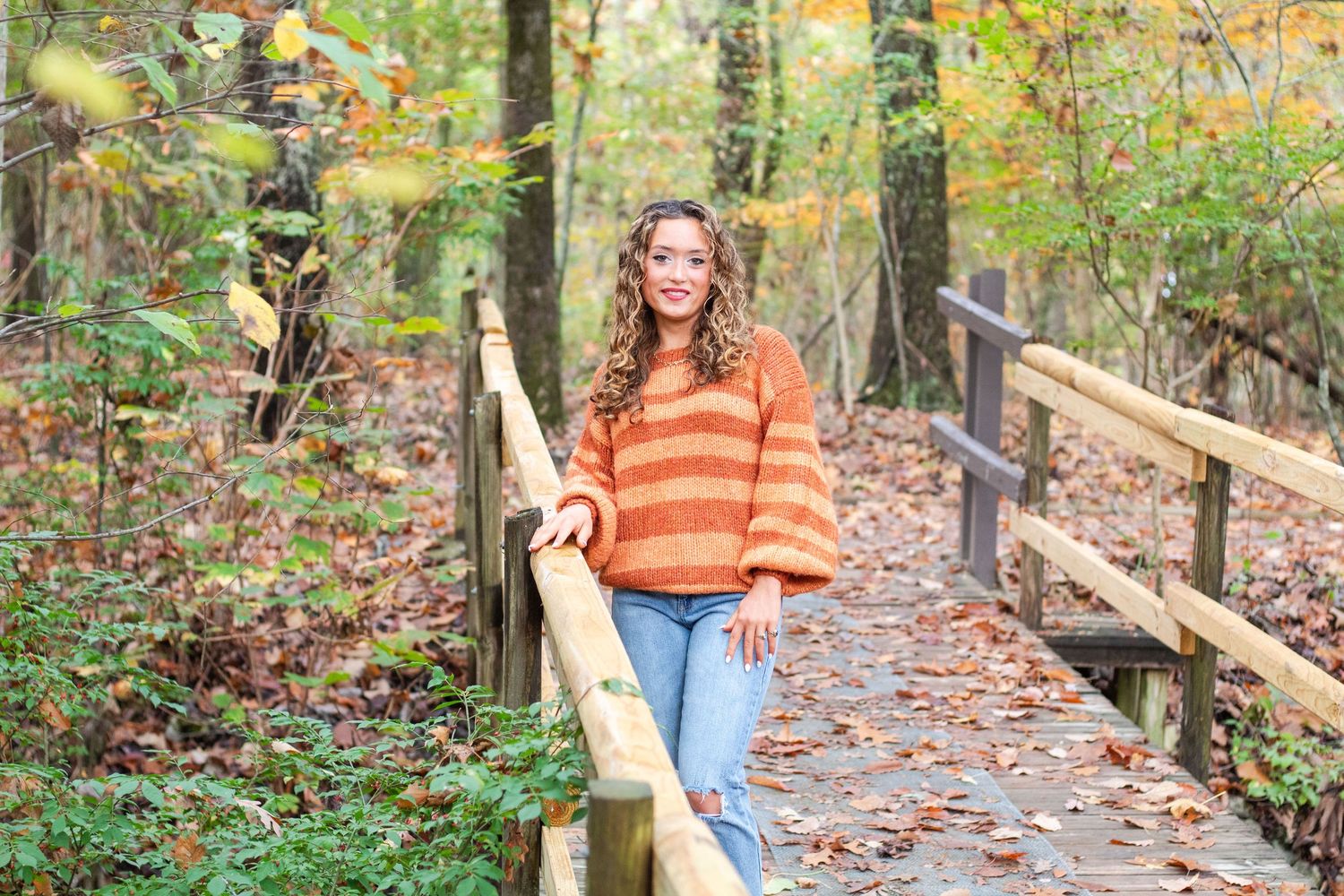 High school senior in woods.