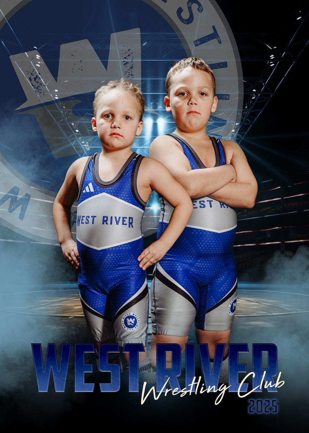 Youth wrestlers in blue and white West River singlets pose for a dramatic sports team photo with smoky background effects.