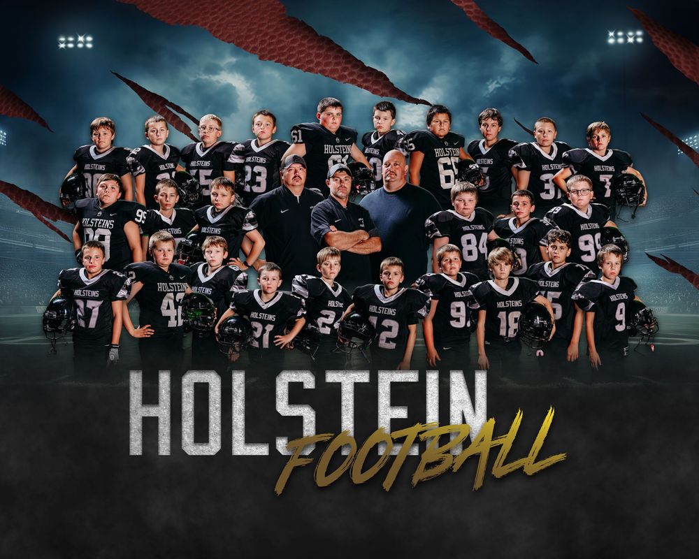 Professional sports team group photo taken against moody dark backdrop with dramatic lighting and backup athletes.