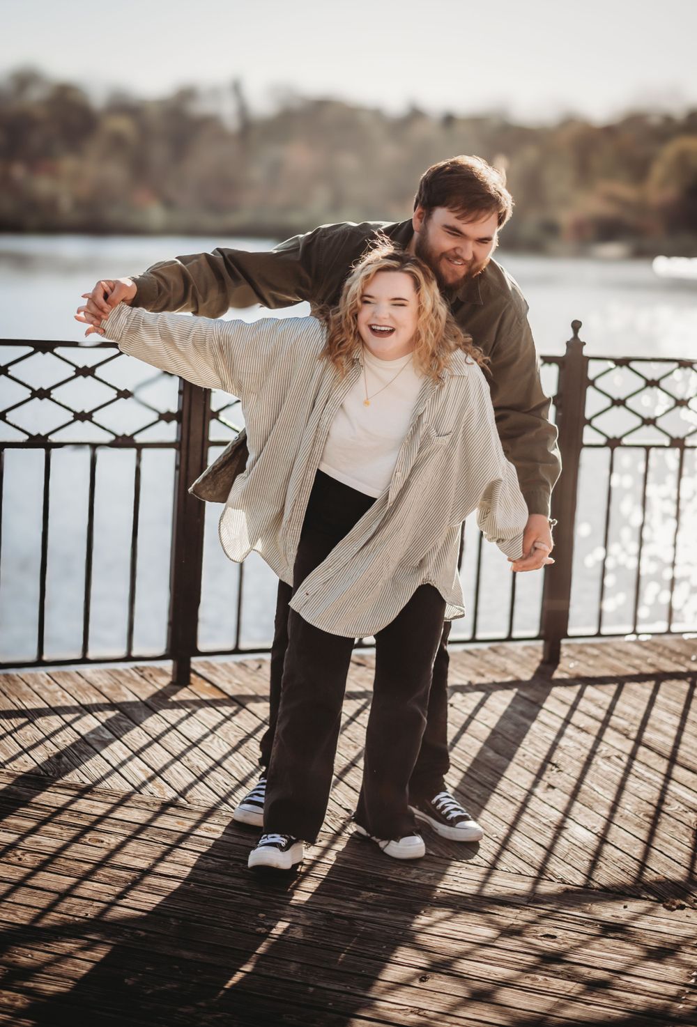 Fun by the river couple