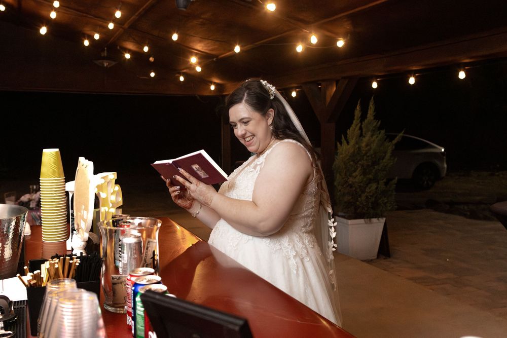 Evening wedding reception with string lights creating a warm ambiance.