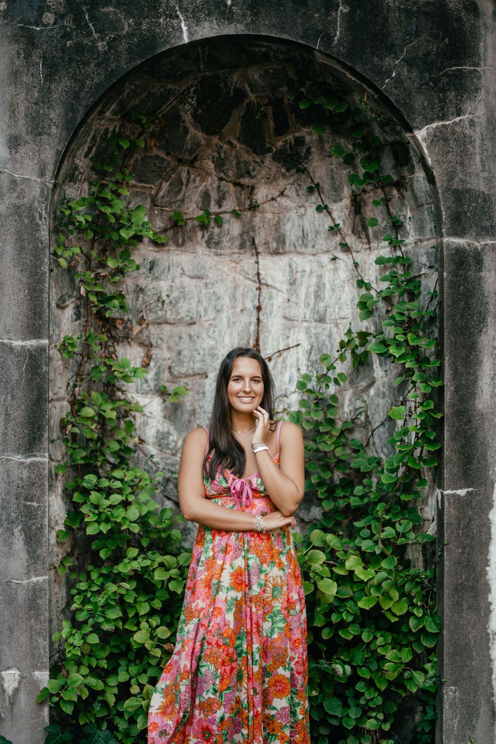 High school senior at the Atlanta History Center for senior photos in front of an ivy wall