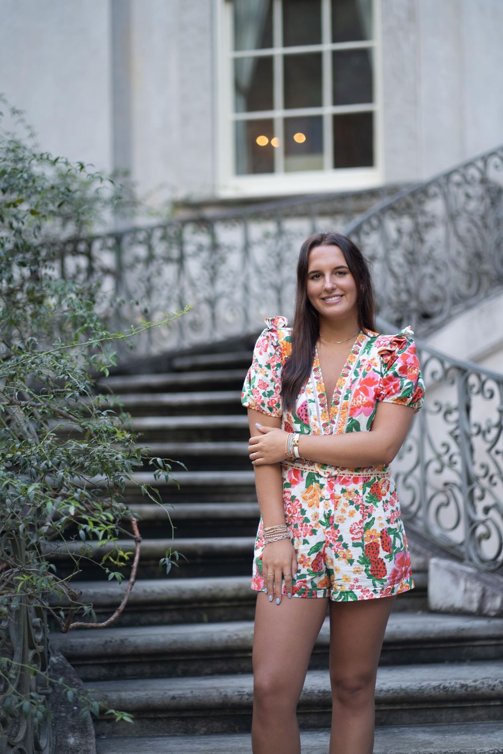 High school senior at the Atlanta History Center for senior photos standing on the steps