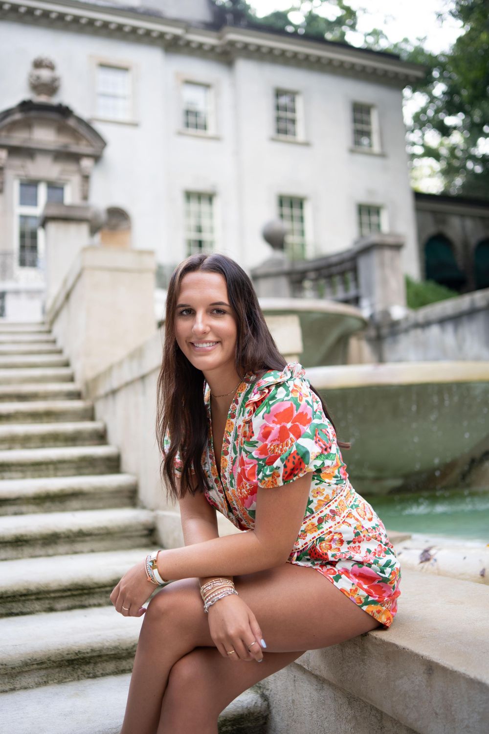 High school senior at the Atlanta History Center for senior photos in front of the Swan house on steps