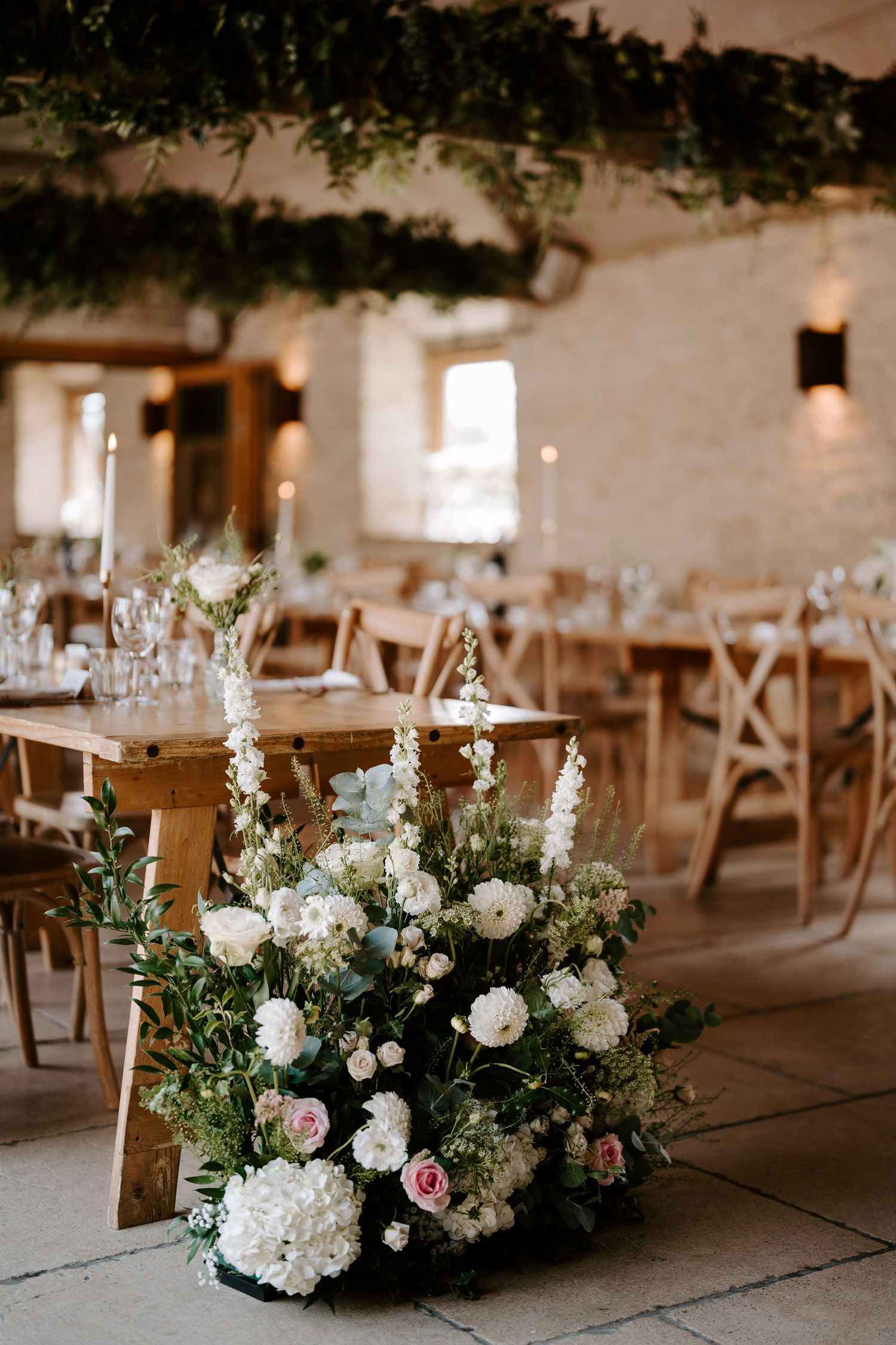wedding flowers during feast at yardspace old gore in cirencester