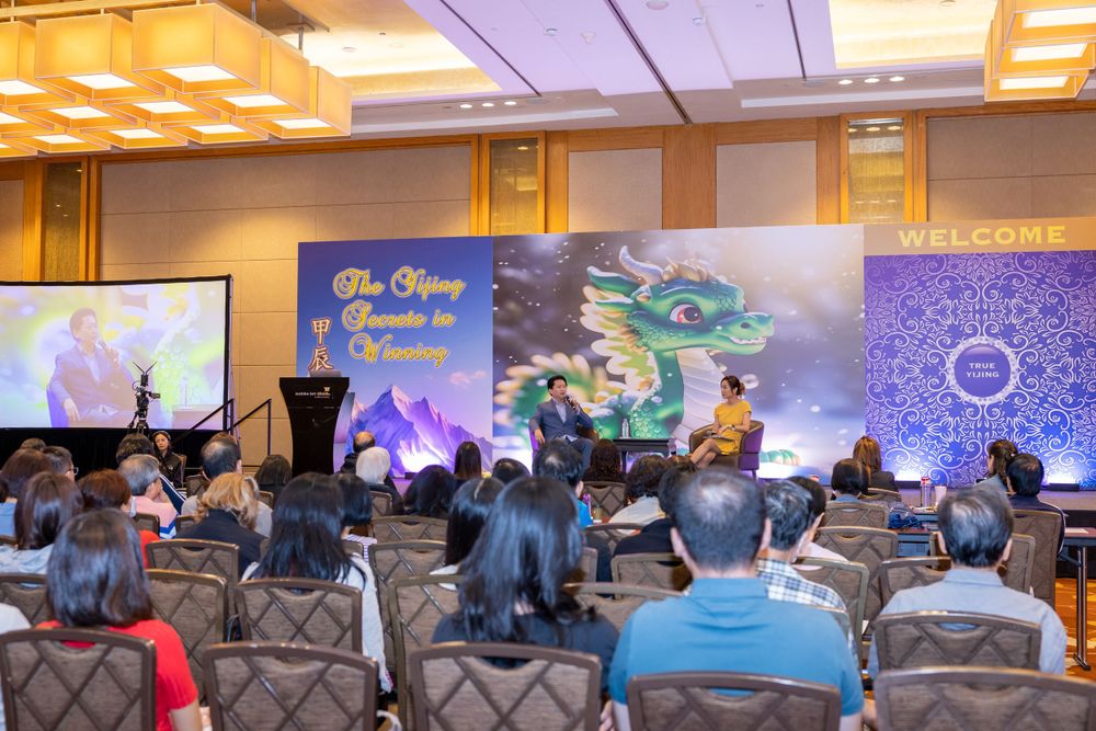 Business conference room with large projection screen showing fantasy themed presentation.