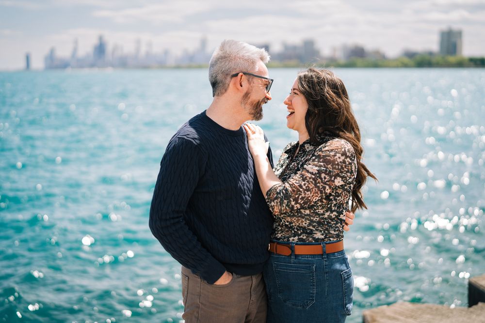 Engagement portraits by Two Birds Photography at Montrose Harbor in Chicago, Illinois.