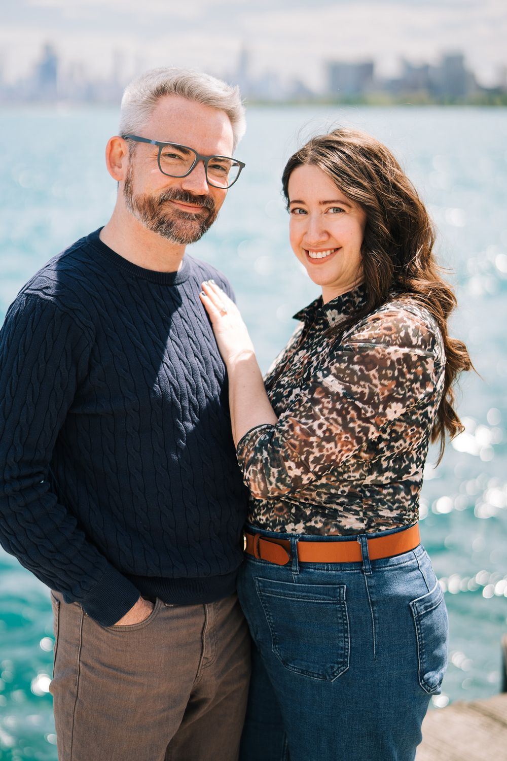 Engagement portraits by Two Birds Photography at Montrose Harbor in Chicago, Illinois.