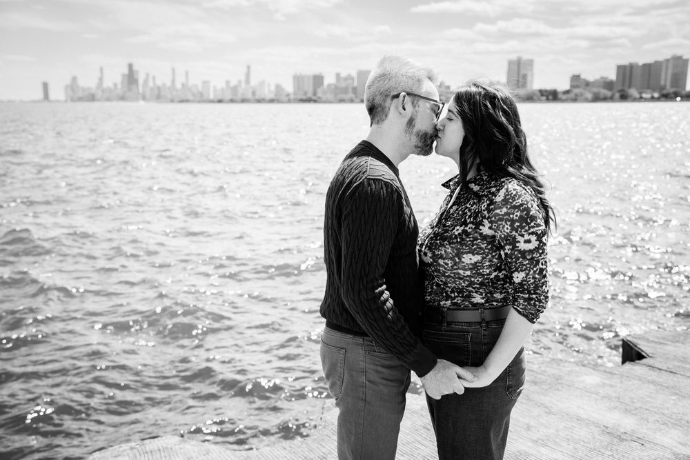 Engagement portraits by Two Birds Photography at Montrose Harbor in Chicago, Illinois.