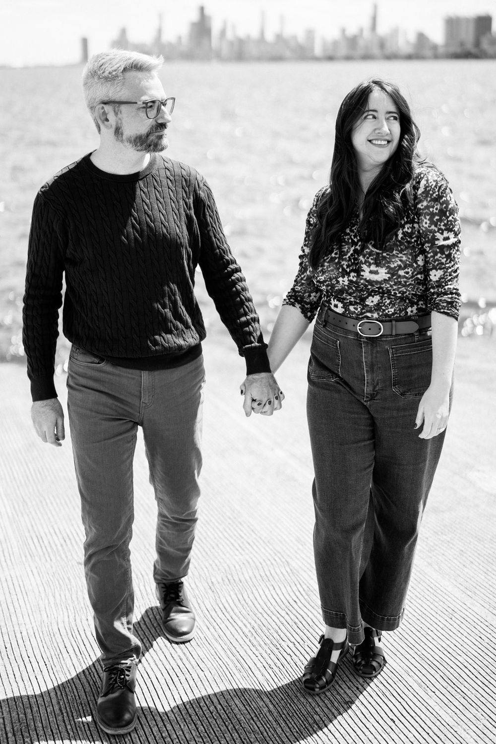 Engagement portraits by Two Birds Photography at Montrose Harbor in Chicago, Illinois.