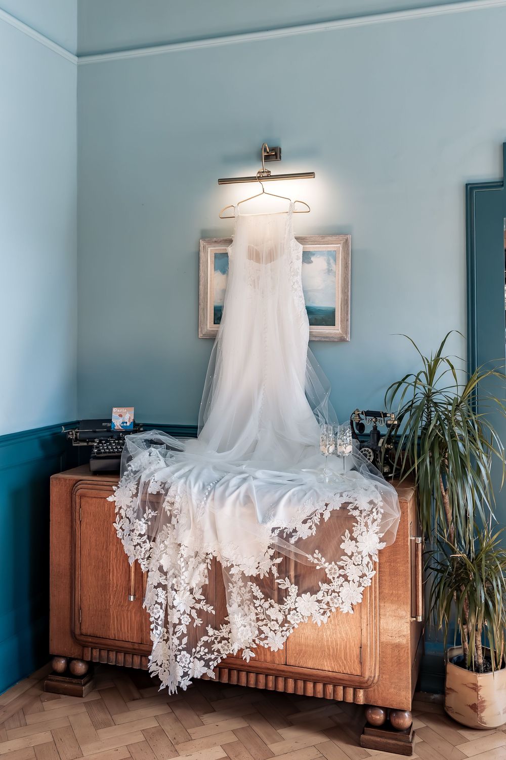 Documentary wedding phot of a brides dress set up for a stunning photo.