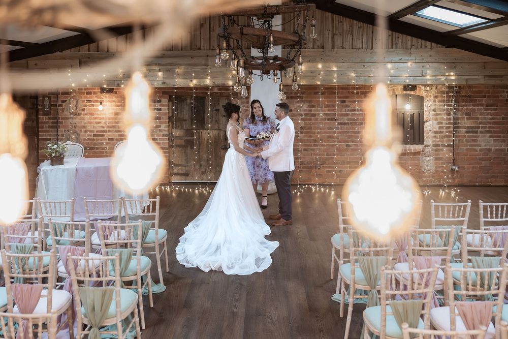 An unobtrusive photo of an intimate ceremony at a Yorkshire wedding venue.