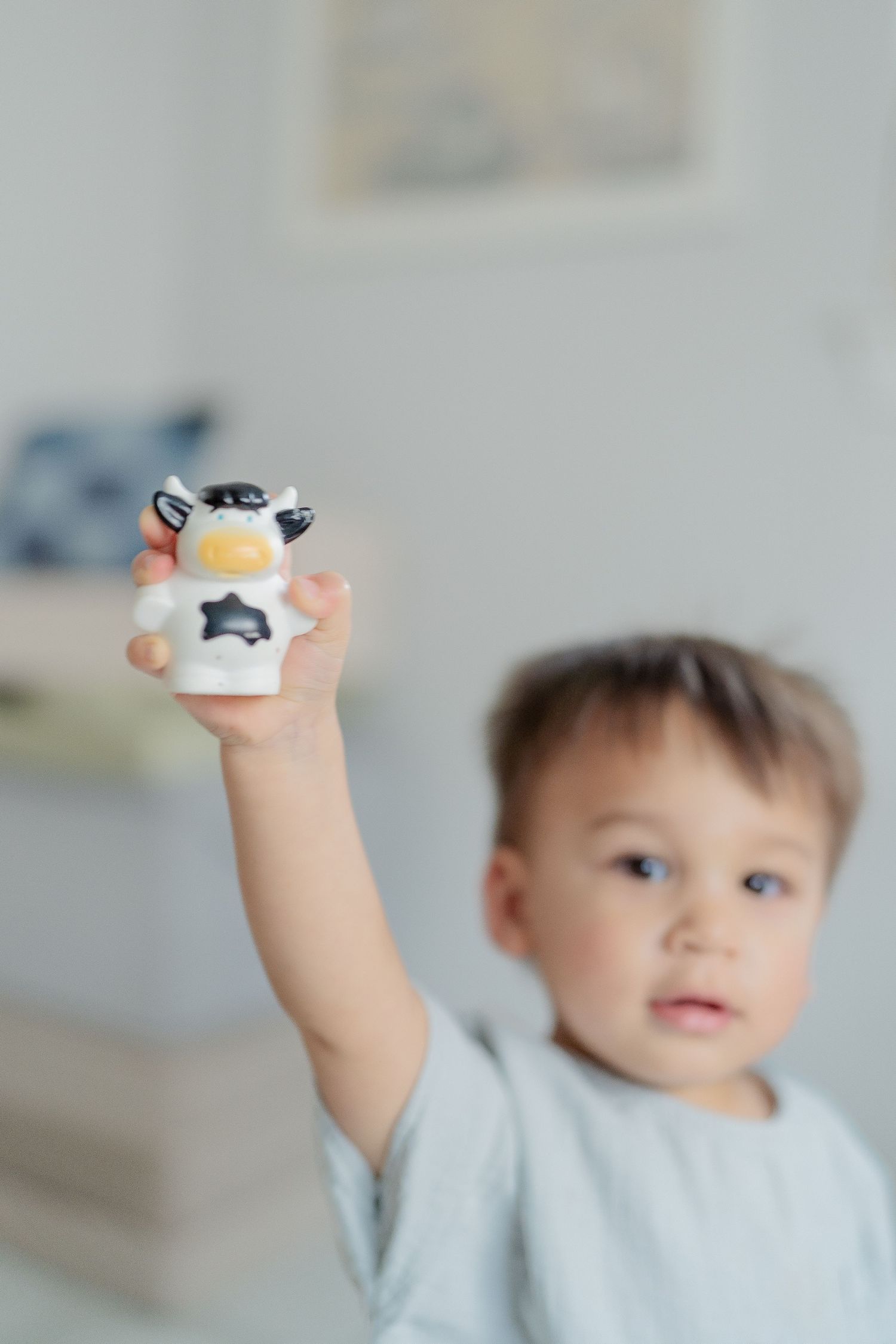 Toddler playing with toys in nursery