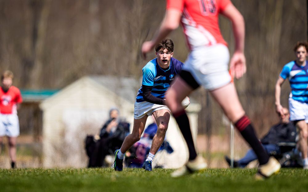 Elizabethtown Blues Rugby player reads the field vs Cumberland Valley, Old Trolley Line Park 2026 — SportsFox Photography