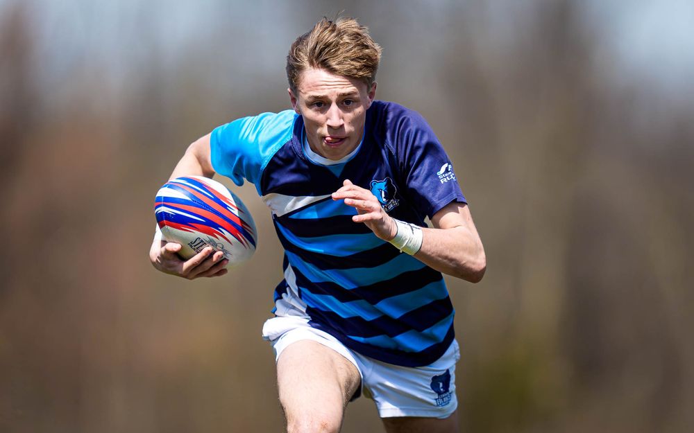 Elizabethtown Blues Rugby player sprints in open field vs Cumberland Valley, Old Trolley Line Park 2026 — SportsFox Photography