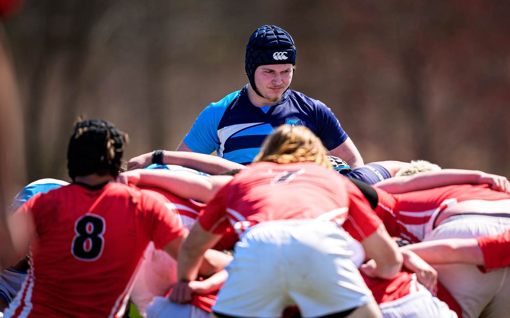 Elizabethtown Blues Rugby player surveys the field at scrum vs Cumberland Valley, March 2026 — SportsFox Photography