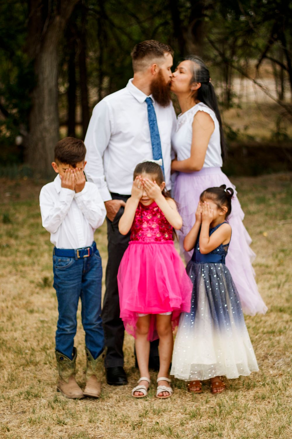 A family of five during a family photo session at The League House in Amarillo, Texas