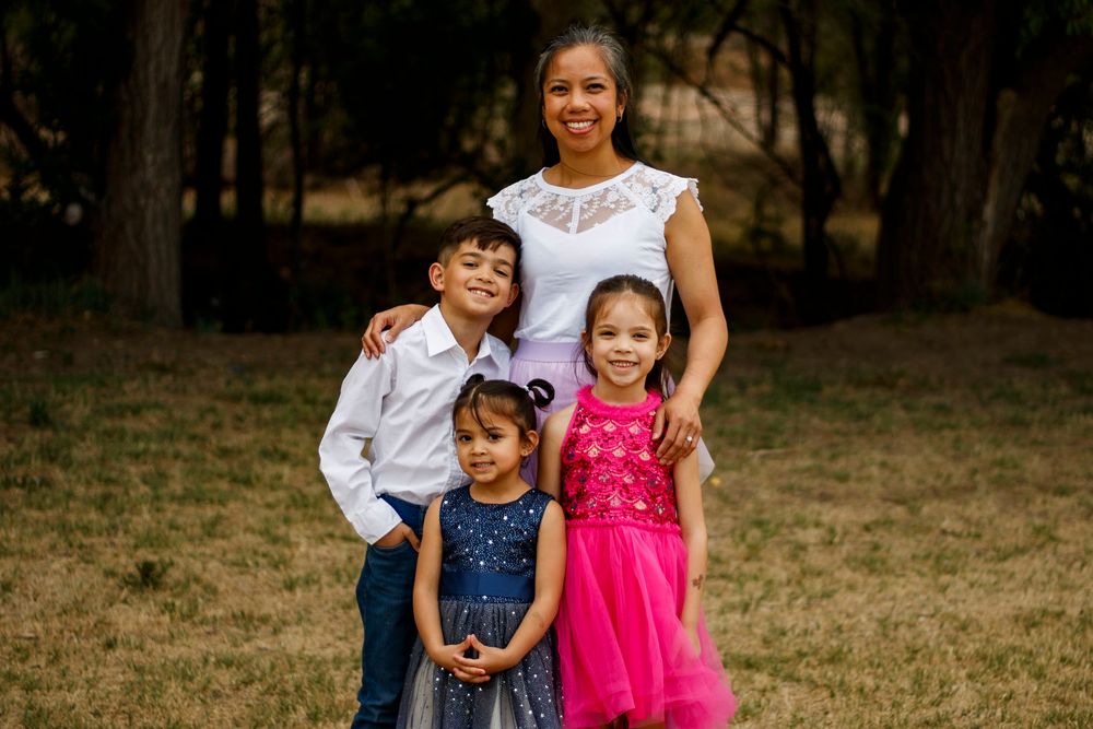 A mother and her children during a family photo session at The League House in Amarillo, Texas