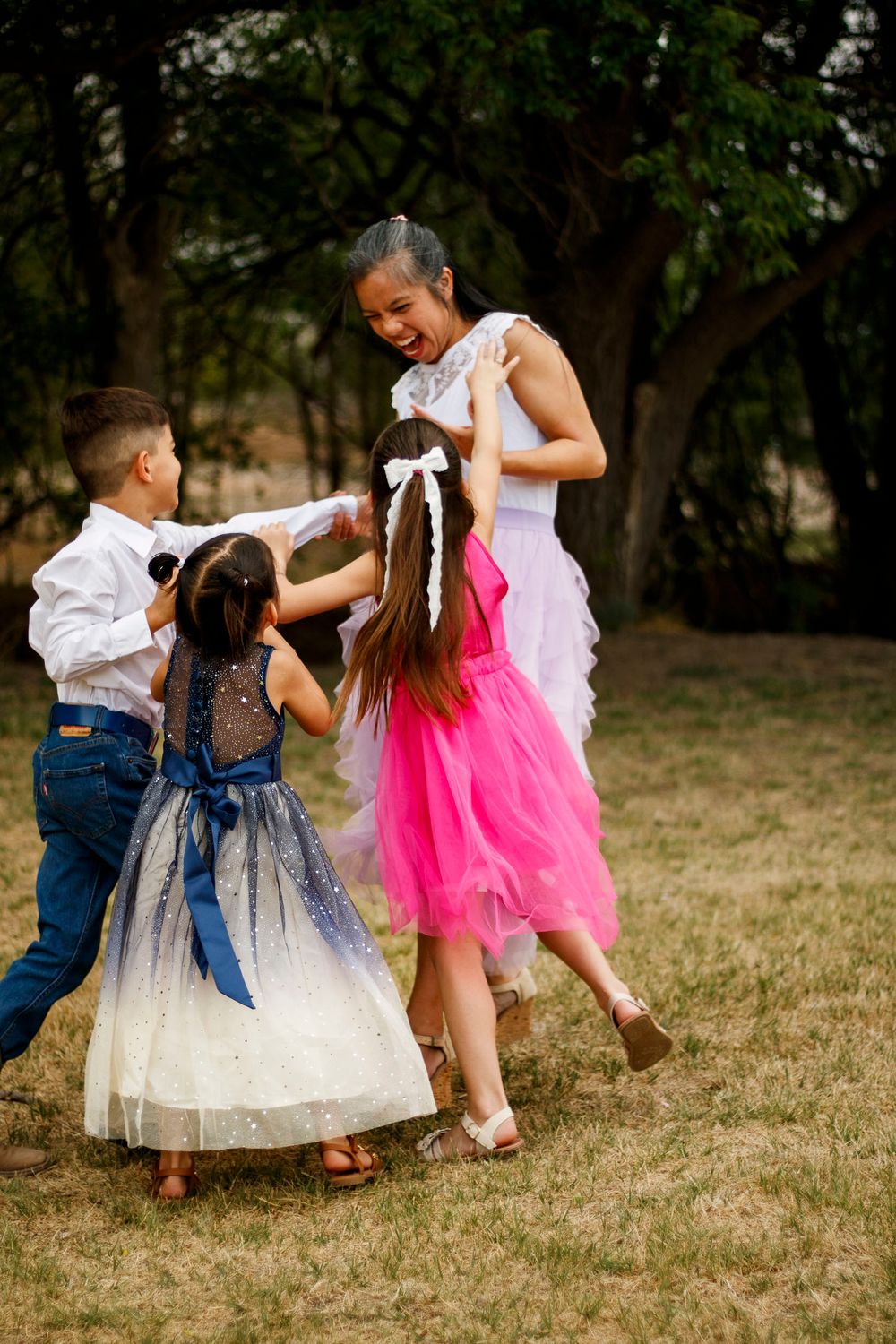 A mother and her children during a family photo session at The League House in Amarillo, Texas