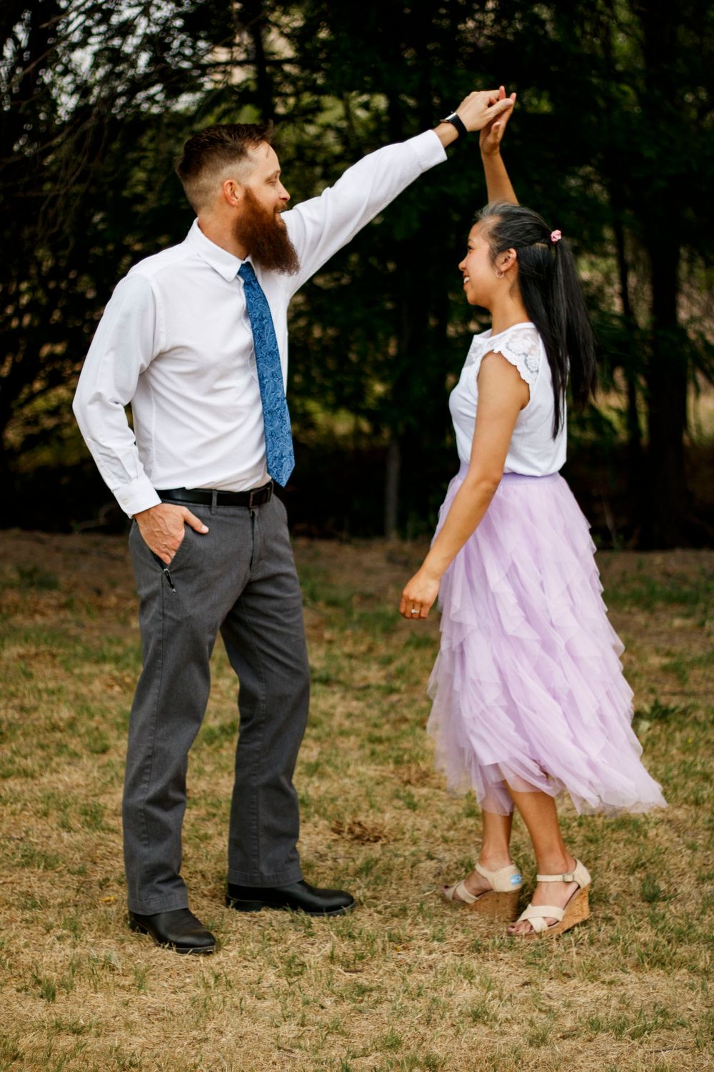 A couple during a family photo session at The League House in Amarillo, Texas