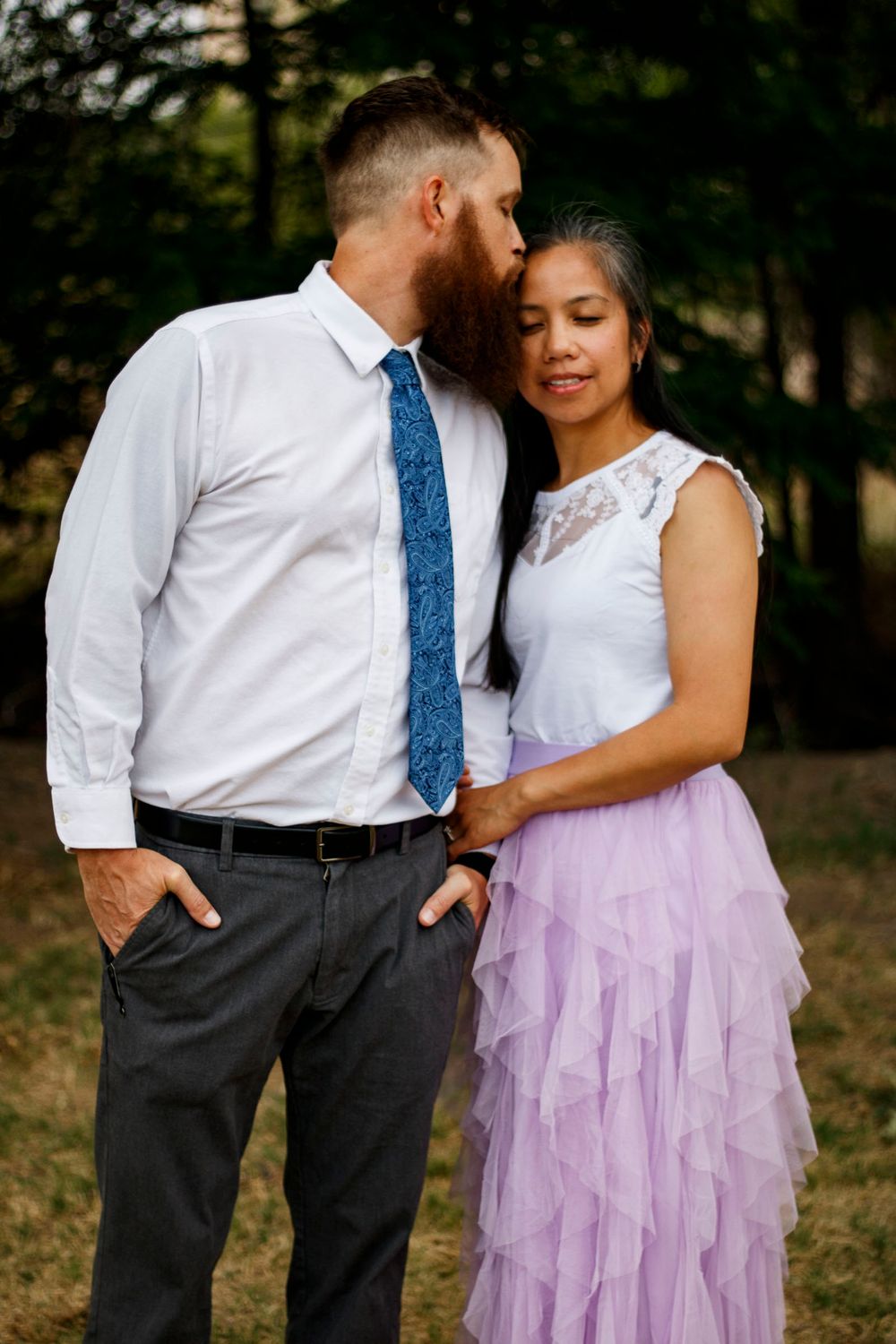 A couple during a family photo session at The League House in Amarillo, Texas