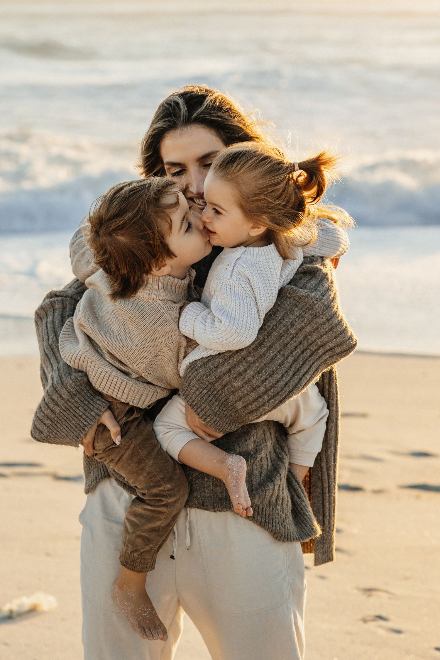 siblings at the beach